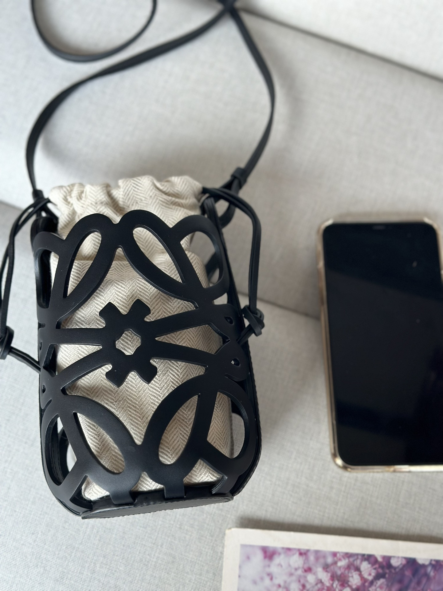 L0ew* anagram cut-out pocket in classic calfskin and canvas 20x11x8cm